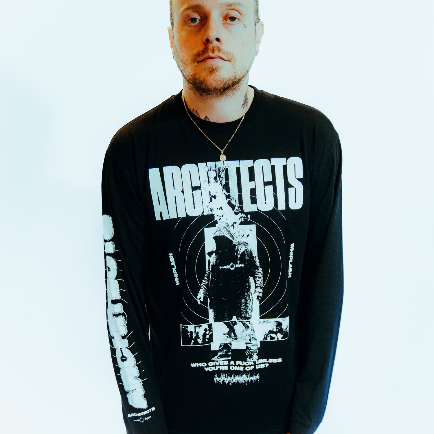 Black long-sleeve regular fit t-shirt with Architects 'Who gives a F*ck unless you're one of us' Whiplash print across the front, and Architects logo across the sleeve