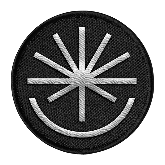 Black patch with silver starburst design.