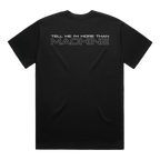 A black short-sleeve t-shirt shown from the back, featuring a white typewriter-style text graphic on the upper back.