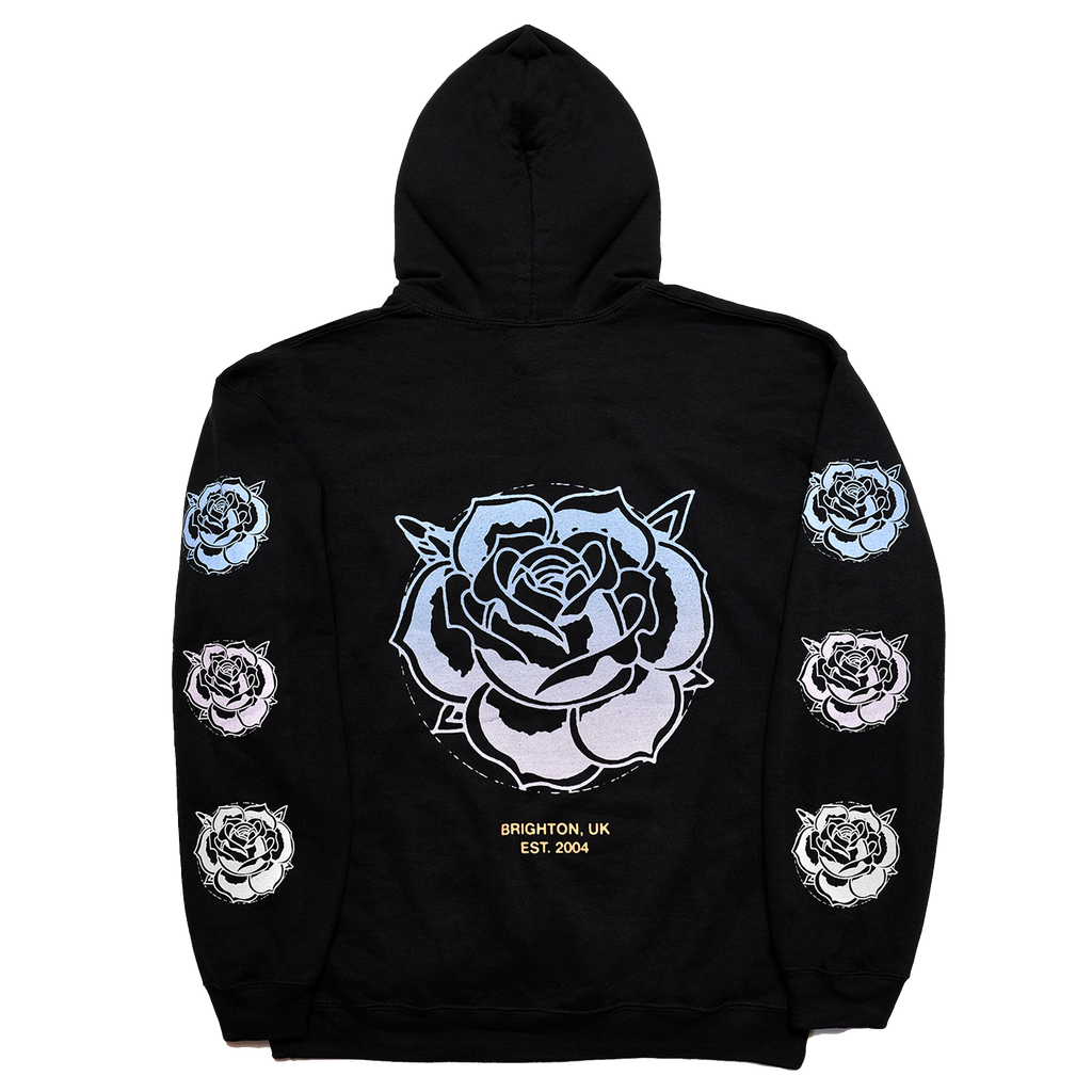 Black regular-fit unisex hoodie featuring a blue Architects rose print across the back, with blue, pink, and white rose prints along the sleeves.