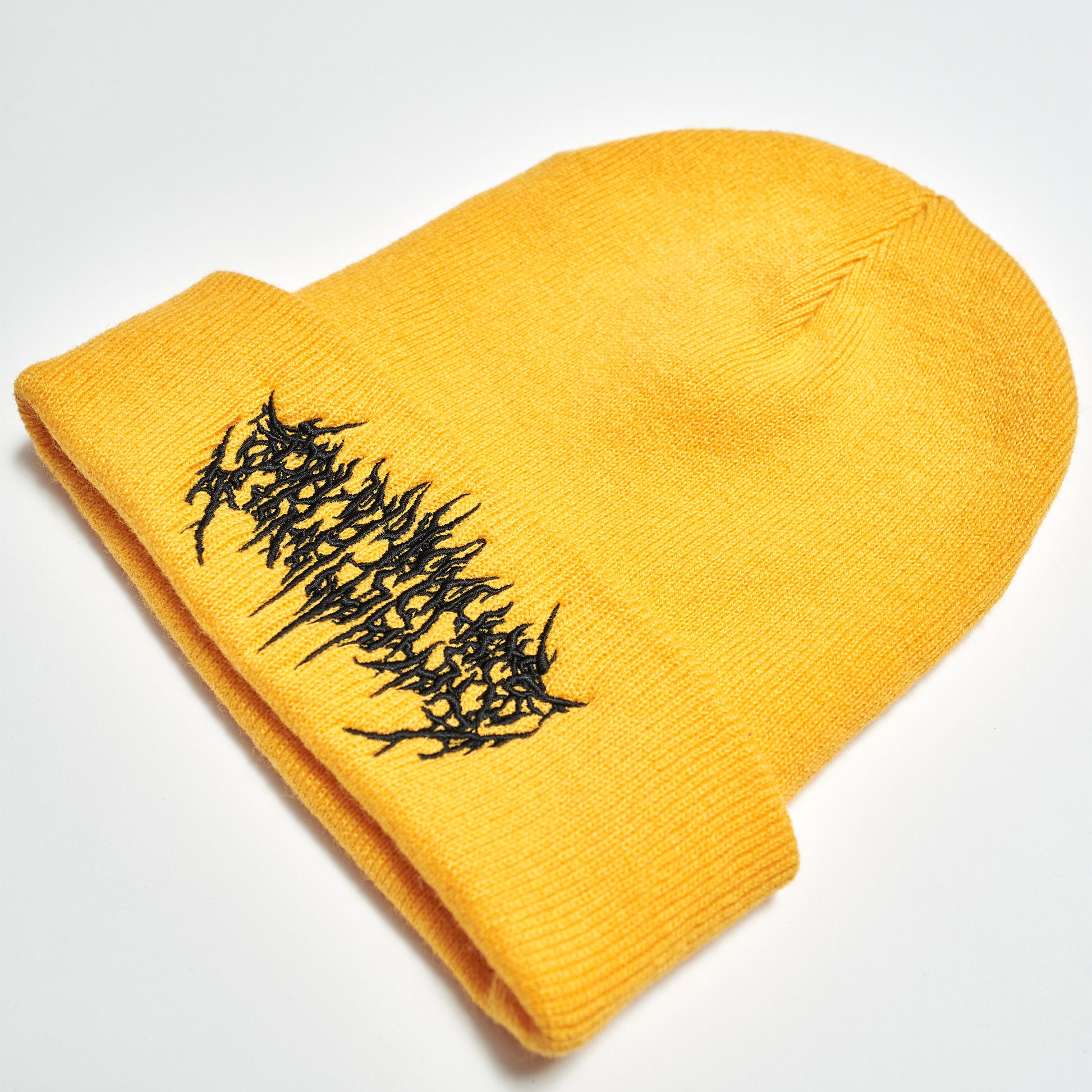 Yellow beanie featuring Barbed Wire Architects embroidery across the front