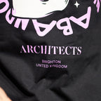 Black Unisex short-sleeve t-shirt with pink Architects "All Our God Have Abandoned Us" skull print across the front