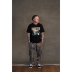 Black short-sleeve unisex regular fit t-shirt with Architects tree print across the front