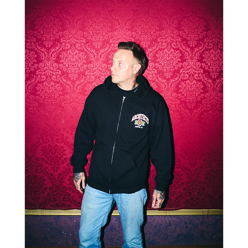 Black unisex zip-up hoodie with Architects Floral Panther print on the front right chest. 
