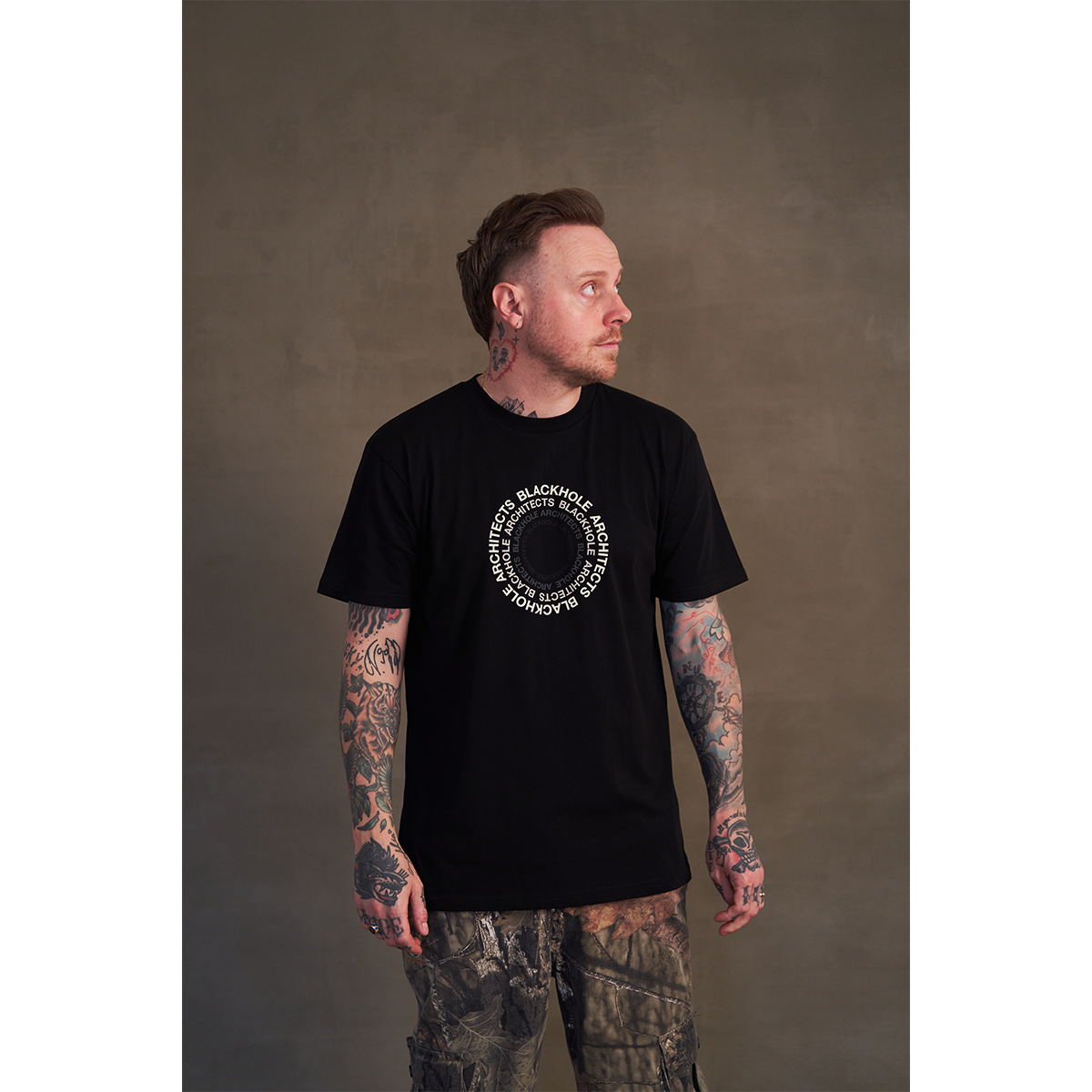 Black short-sleeve unisex regular fit T-shirt with an Architects circle Blackhole print across the front chest.