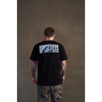 Black short-sleeve unisex regular fit T-shirt with Architects text print across the back