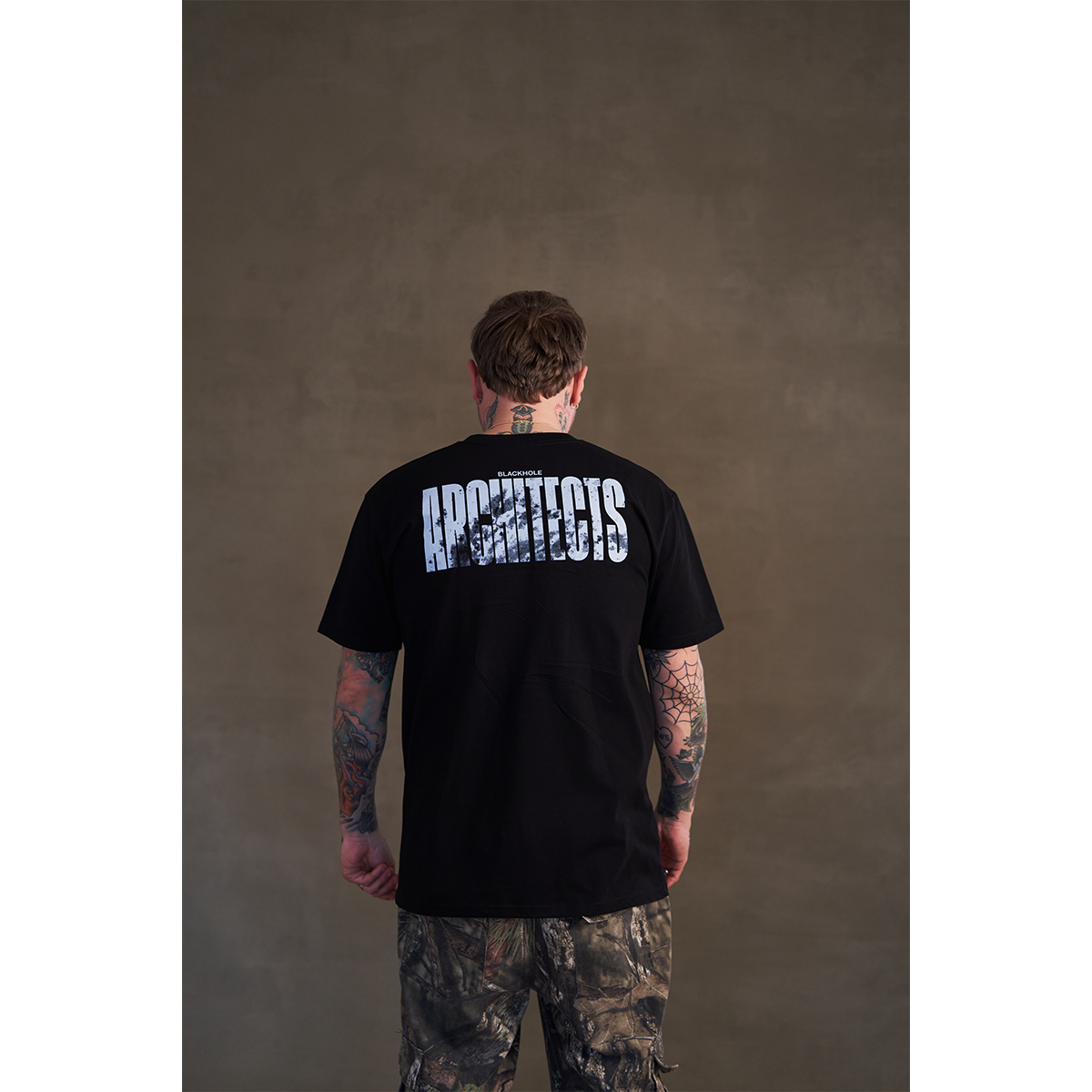 Black short-sleeve unisex regular fit T-shirt with Architects text print across the back