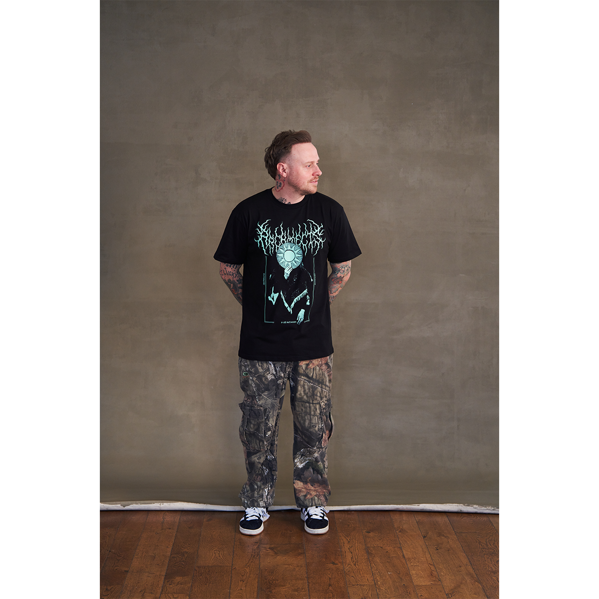 Black short-sleeve unisex regular fit T-shirt with Architects occult glow-in-the-dark print across the front.