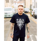 Black Short-sleeve unisex T-Shirt with Architects Astronaut print across the front