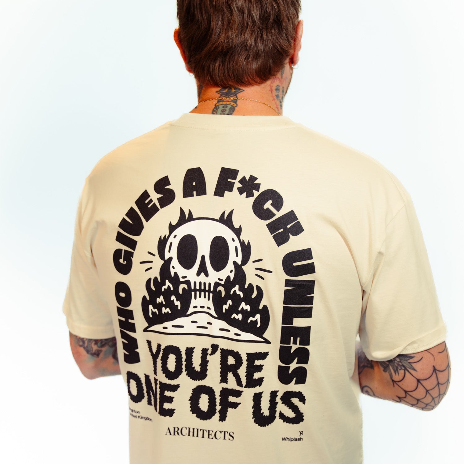 Ecru unisex short-sleeve T-Shirt featuring an Architects "Who Gives a Fuck" across the back.